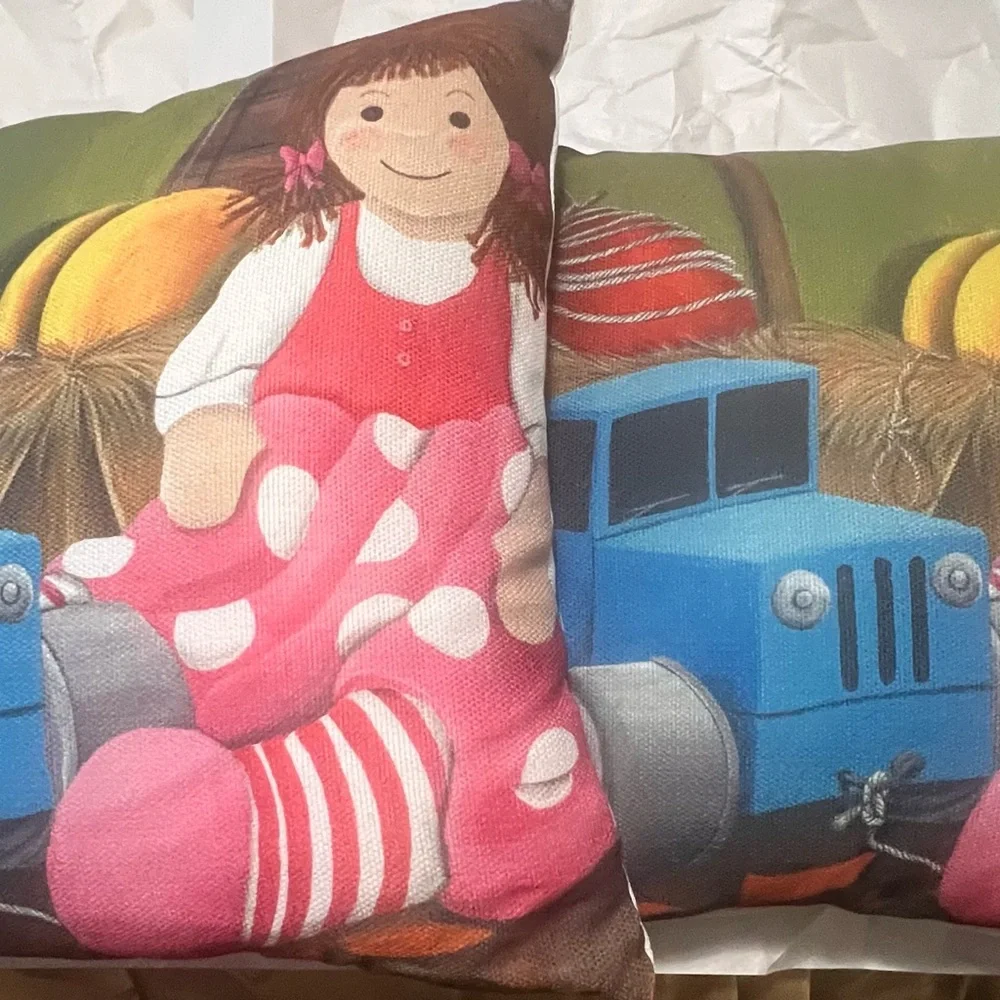 Mandy Pritty whimsical Art throw pillows/2 .blue tractor and doll- pristine
